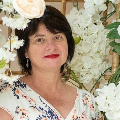 Ionela Bacain — Founder of BlissMind Coaching logo