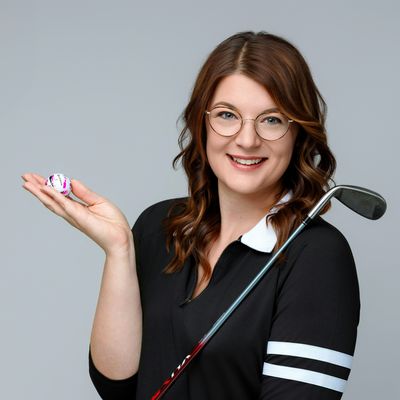 Yes She Golfs logo