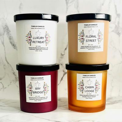 THMILUX CANDLES logo