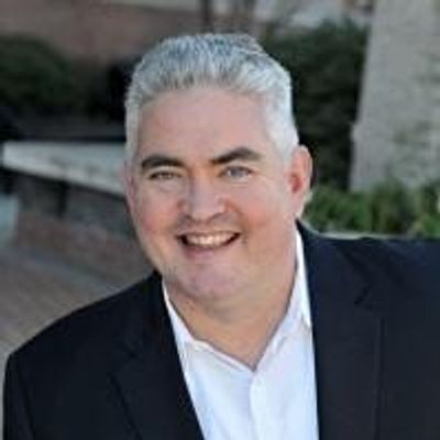 ActionCOACH of SE NC logo