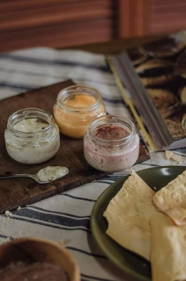 A Party of Bottled Dips Served with Flatbreads and Breadsticks, Heny