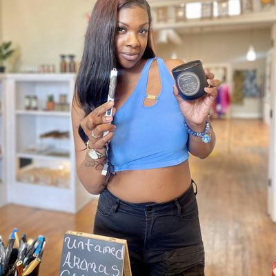 Untamed Aromas Candles logo