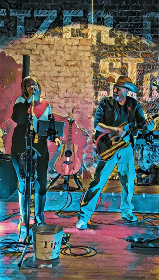 Taplow performs at singer/songwriter night at Wired Coffee Espress,
