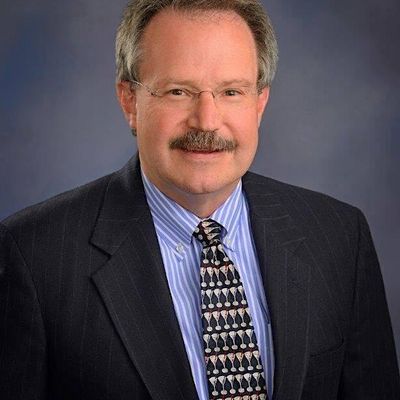 Patrick Davidson-PRMG logo