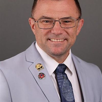 Eddie Ruettiger logo