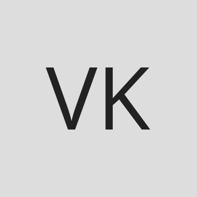 Volodymyr Poshpur, Realtor, KOMAR logo