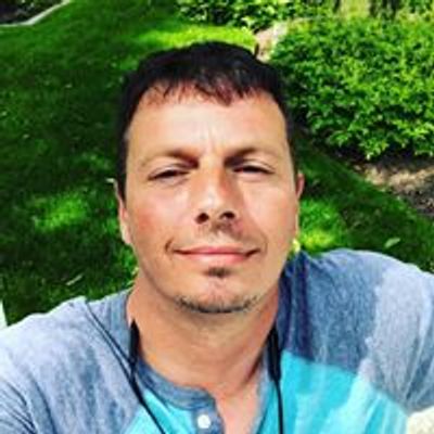 Glenn J. Raymond logo