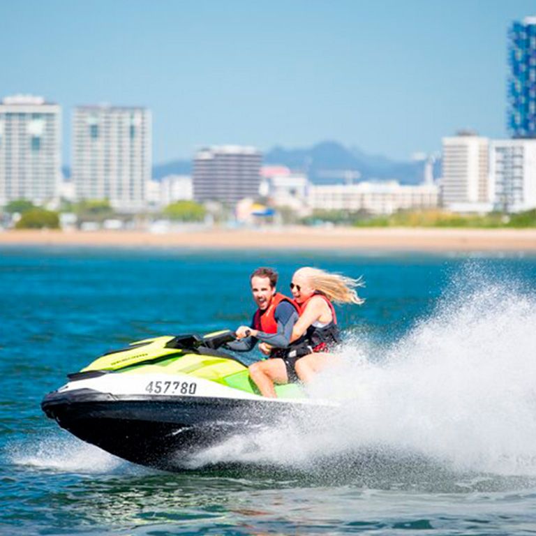 riding a jet ski in the ocean