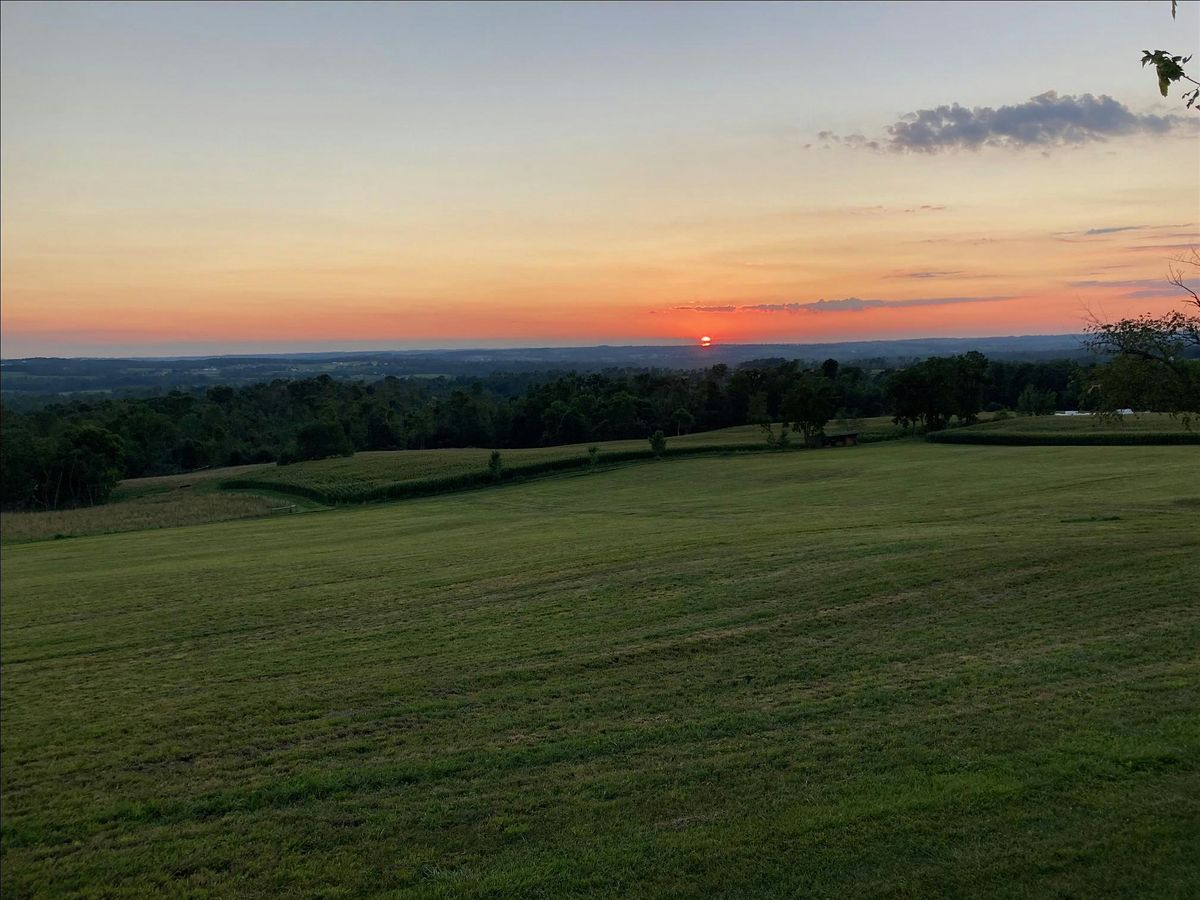 2024 Total Solar Eclipse Gathering on a hilltop with an amazing view