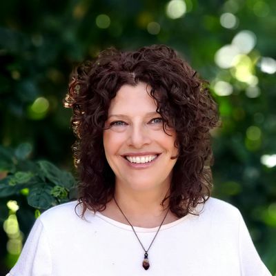 Linda Rogers and Healing Tiger Reiki logo