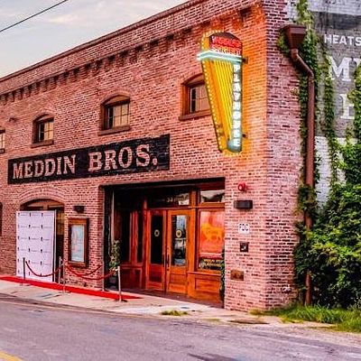 The Village Repertory Co. logo