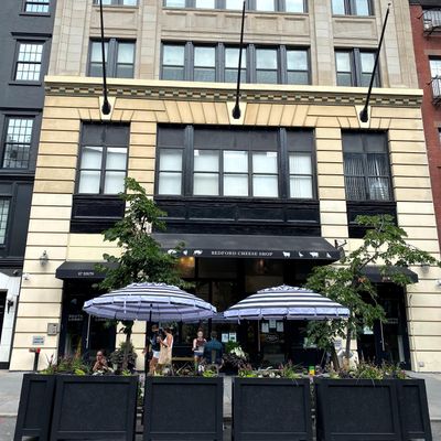 The Homestead at Bedford Cheese Shop logo