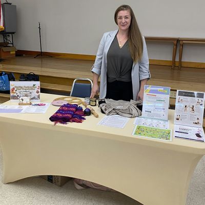 Megan Calomiris logo