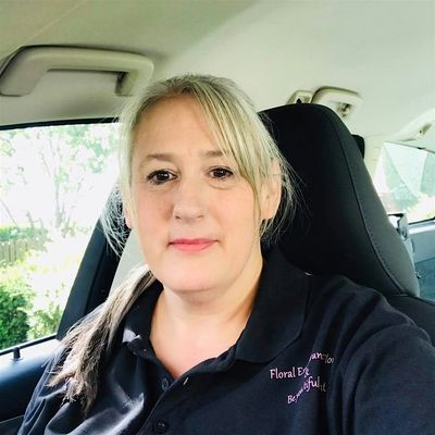 Floral Exuberance Florist and Event Styling logo