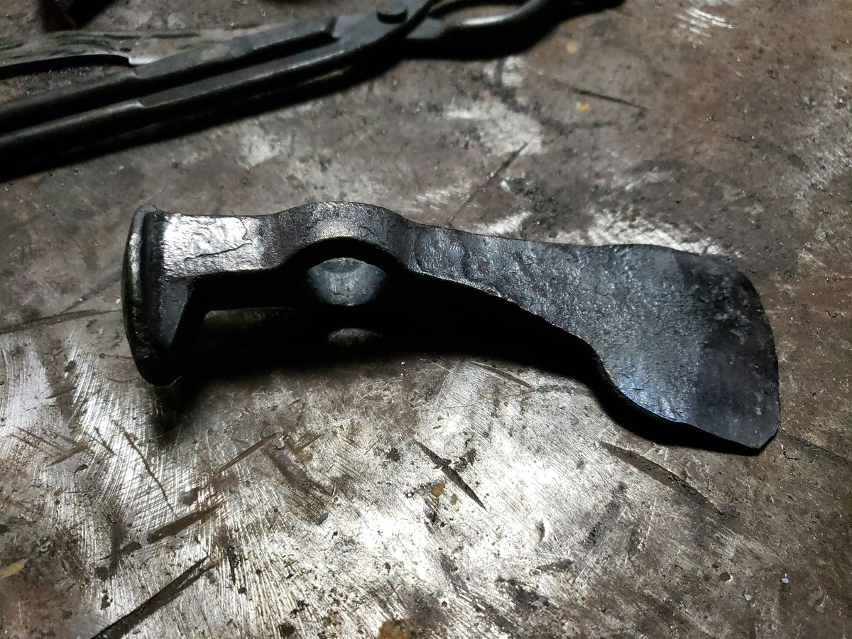 Railroad spike into a Tomahawk or KnyFe* Class